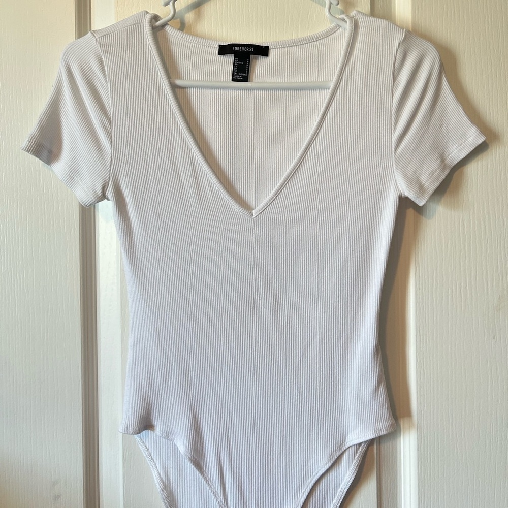 Forever 21 white, v-neck, ribbed, bodysuit.